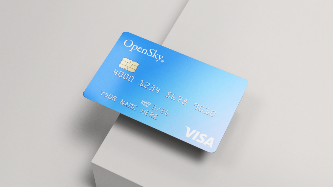 The opensky business credit card on the edge of a table.