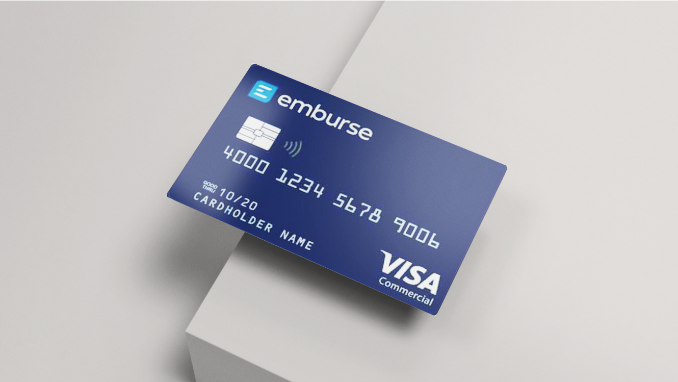 The Emburse business credit card on the edge of a table.